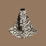 The Wildride toddler carrier in a brown zebra print design