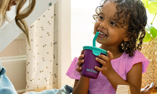 child drinking from klean kanteen kid cup