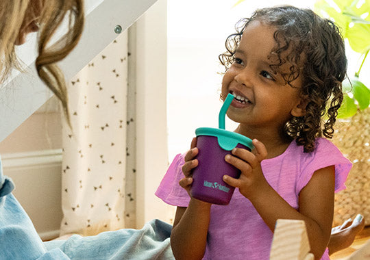 child drinking from klean kanteen kid cup