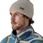 A male adult wearing the grey beanie