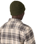 The back of the green beanie