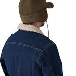 The back of the brown cord Pataognia earflap cap.