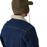 The back of the brown cord Pataognia earflap cap.