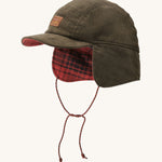 A brown cord Patagonia earflap cap with a red check design on the inside with the flaps down on a cream background.