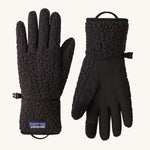 A pair of black Patagonia fleeced gloves on a cream background.