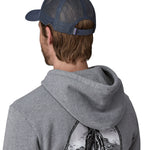 The back of the navy Patagonia trucker hat