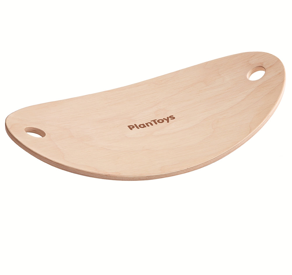 The PlanToys Balance Board on it's own on a plain background. 