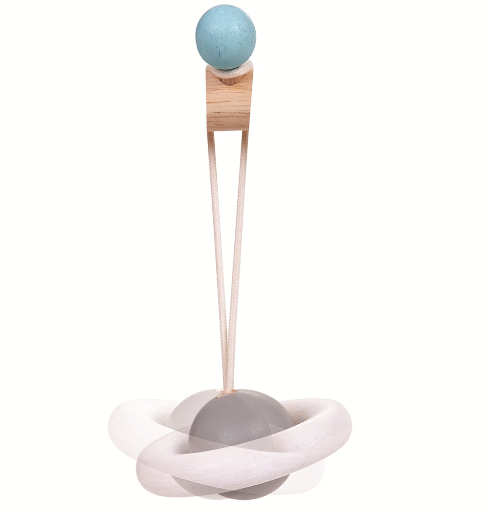 The planet hanging toy from the PlanToys Pastel Play Gym.
