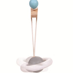 The planet hanging toy from the PlanToys Pastel Play Gym.