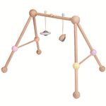 The PlanToys Pastel Play Gym on a plain background. 