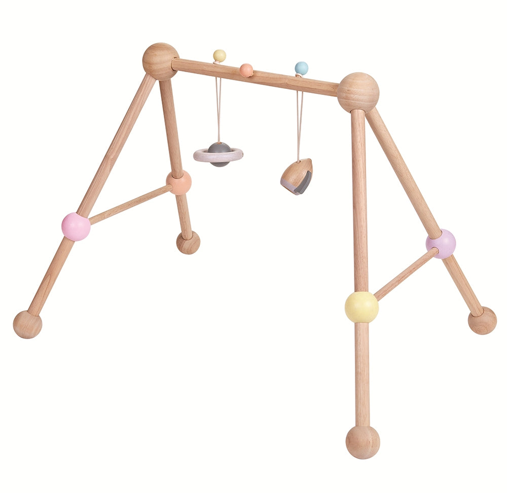 The PlanToys Pastel Play Gym on a plain background. 