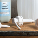 Bio-D screw on pump and tap for 5 and 10 litre bottles in front of Cleansing hand-wash bottle