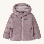 Light pink kids Patagonia down jacket on a cream background