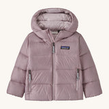 Light pink kids Patagonia down jacket on a cream background
