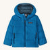 Light blue kids Patagonia down jacket on a cream background
