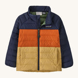 Dark blue, orange and gold kids Patagonia down jacket on a cream background