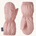A pair of pink Patagonia mittens on a cream background