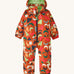 A orange all in one snowsuit with different coloured shapes on a cream background