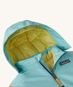 A close up of the hood on the all in one snowsuit