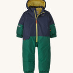 A navy and green hooded all in one snowsuit on a cream background.