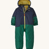 A navy and green hooded all in one snowsuit on a cream background.