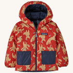 The reversible fox print Patagonia jacket on a cream background