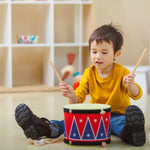 Plan Toys Big Drum II with a red and blue zig zag pattern