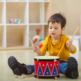 Plan Toys Big Drum II with a red and blue zig zag pattern