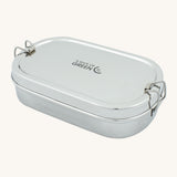 A slice of green oval lunchbox with mini container available at Babipur. A circular stainless steel lunchbox with a clip fastener on each side