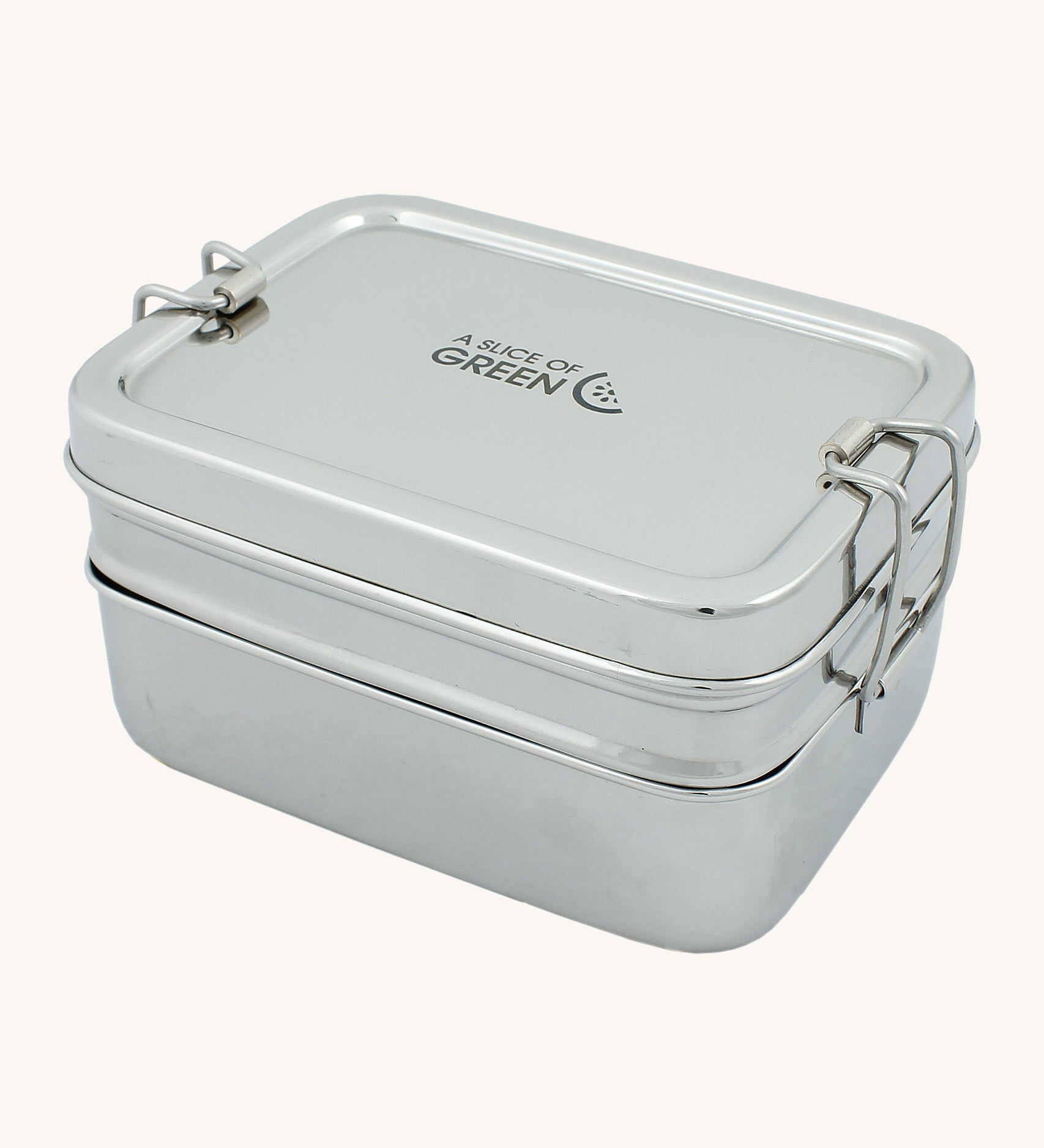 A slice of green two tier lunch box with mini container available at Babipur. A stainless steel two tier rectangular lunchbox with clips on each side for a secure lock