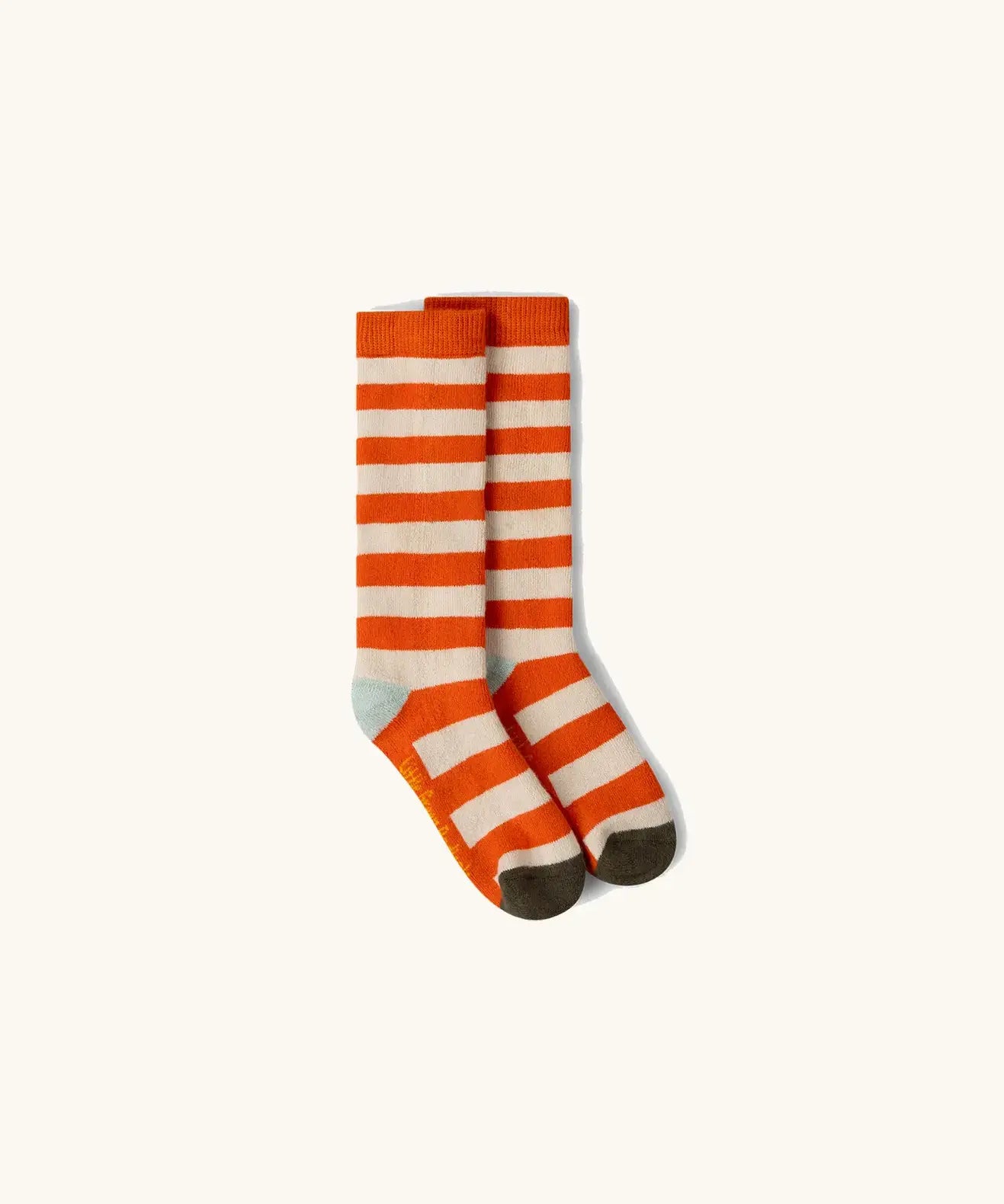Orange and white striped socks from the Little Green Radicals red apple organic cotton boot socks in a 2 pack. 