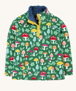 Frugi fun-guys snuggle fleece. A mushroom themed print on a green coloured background. 