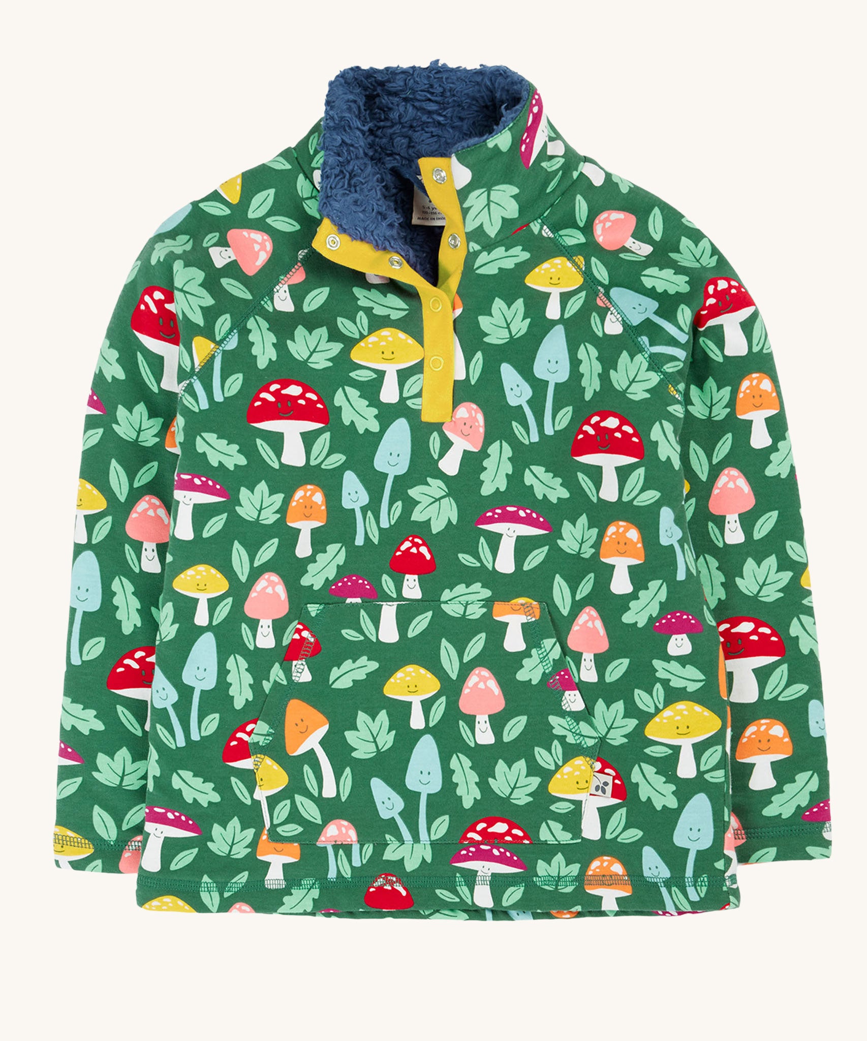 Frugi fun-guys snuggle fleece. A mushroom themed print on a green coloured background. 