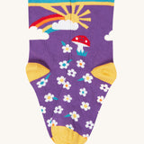 The purple multi-coloured flower and rainbow, sun design socks from the Frugi rock my socks flowers socks multi-pack of children's organic cotton socks.
