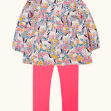 Frugi organic cotton Charlotte outfit. All over floral flight, frilled shoulder long sleeve top with rhubarb pink leggings.