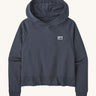 Patagonia Women's Regenerative Essential Hoody - Smolder Blue. A navy blue hoody with a small Patagonia logo on the chest