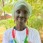 A portrait image of Hana, a artisan refugee bead maker from South Sudan