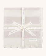 Avery Row Stripe Knit Organic Baby Blanket - Oat Melange, a knitted white and oatmeal stripe baby blanket wrapped in a branded gift ribbon. 