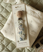 Avery Row Pacifier Holder - Riverbank. A beautfiful Riverbank nature inspired fabric, laid out on an Avery Row Nature Trail muslin cloth