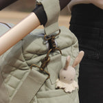 A closer look at the pram clip with the Avery Row Nappy Changing Bag - Sage