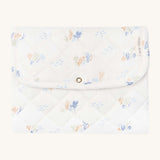 Avery Row Travel Changing Mat - Coastline, a white padded changing mat with delicate seaweed print in soft pastel tones.