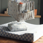 A closer look at the Waves Changing Mat, along with the Waves/Coastline Nappy Caddy and muslin cloth