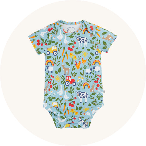 Frugi Super Special short sleeve Body in blue with all-over farm print, made from organic cotton to represent baby bodies at Babipur.