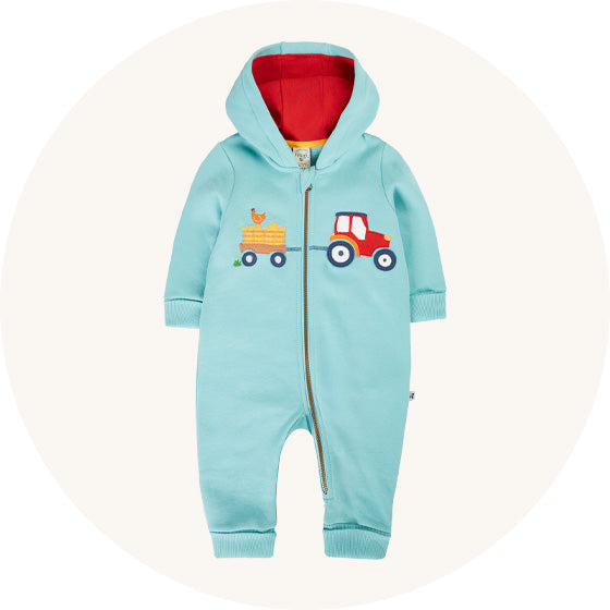 Frugi Hooded Snuggle Suit in Lichen blue with tractor applique, zip up suit made from organic cotton, to represent baby coats and outerwear at Babipur.