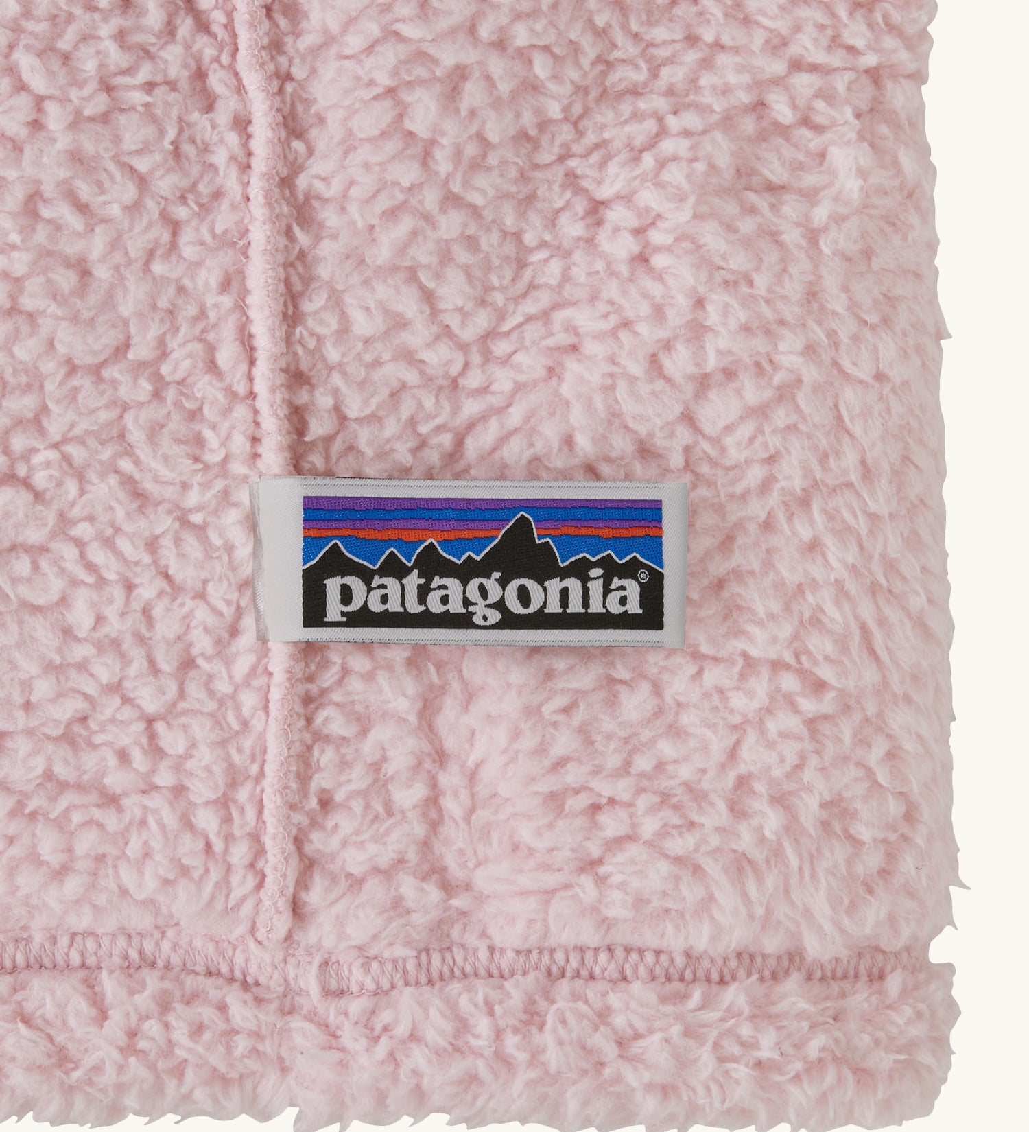 The Patagonia label inside the Patagonia Baby Furry Friends Hoody 
