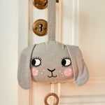 The Roommate Musical Baby Mobile - Bunny hung up on a brass door handle