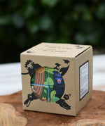 Bajo 2-in-1 polar jungle wooden cube block puzzle shown in it's cardboard box.