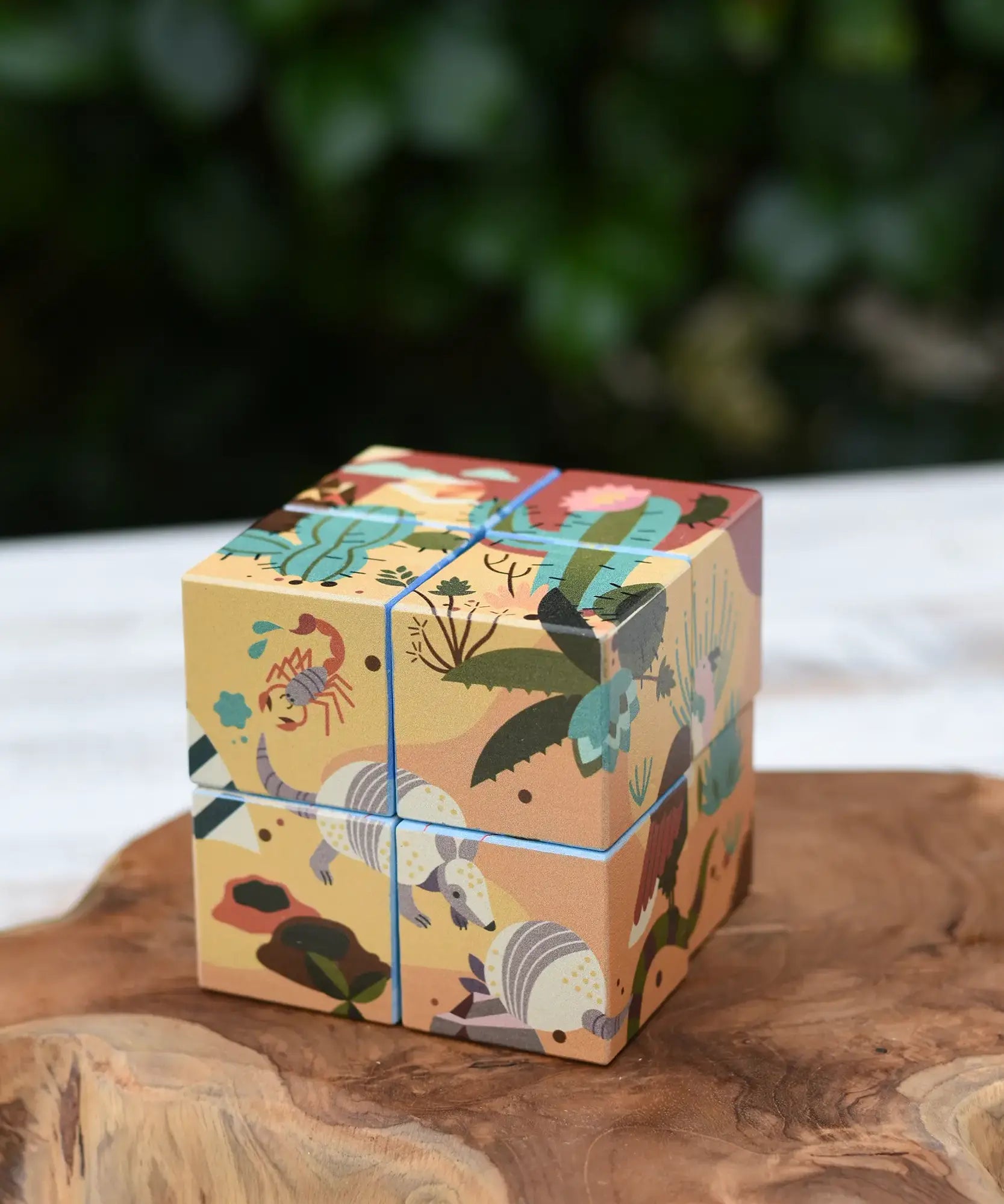 Bajo 2-in-1 reef desert wooden cube block puzzle shown on the desert design side.