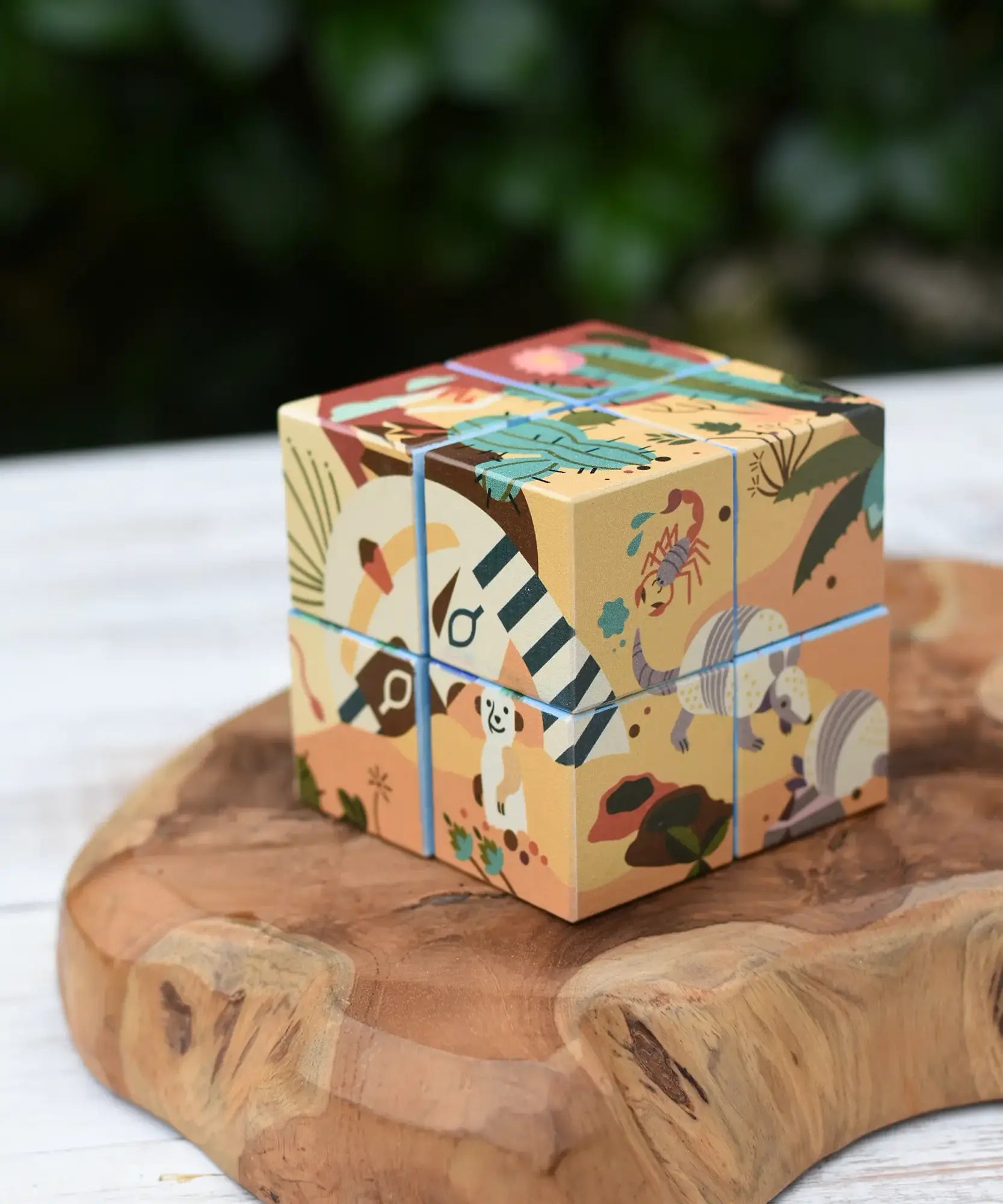 Bajo 2-in-1 reef desert wooden cube block puzzle shown on the desert design side, 