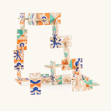 A 3D game made from the Bajo wooden dominoes with abstract designs.